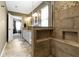 Bathroom featuring a glass-enclosed shower, tiled floors, and double sinks at 203 Winslow Dr, Westfield, IN 46074