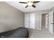 A serene bedroom featuring a cozy beanbag chair, closet, and neutral decor at 203 Winslow Dr, Westfield, IN 46074