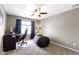 Comfortable bedroom features a gaming setup, chair, desk, and a beanbag chair at 203 Winslow Dr, Westfield, IN 46074