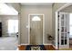 Welcoming entryway with hardwood floors, neutral paint, and decorative rug at 203 Winslow Dr, Westfield, IN 46074
