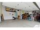Spacious garage with ample storage space and overhead shelving at 203 Winslow Dr, Westfield, IN 46074