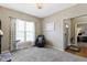 Living room featuring neutral decor, comfortable armchair, and view to entryway at 203 Winslow Dr, Westfield, IN 46074