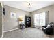 Cozy living room with comfortable seating, neutral tones, and natural light at 203 Winslow Dr, Westfield, IN 46074