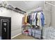 Spacious walk-in closet with wire shelving and ample storage space, including space for hanging clothes at 203 Winslow Dr, Westfield, IN 46074
