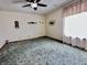 Cozy bedroom with carpet, natural light and a ceiling fan at 204 W Berry St, Alexandria, IN 46001