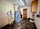 Utility room featuring a modern furnace and classic linoleum flooring at 204 W Berry St, Alexandria, IN 46001