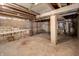 Unfinished basement with visible mechanicals and utilities at 2134 Dawson St, Indianapolis, IN 46203