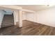 Finished basement featuring new flooring, neutral paint, access to upstairs at 2134 Dawson St, Indianapolis, IN 46203