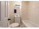 Bathroom featuring new cabinet, sink, mirror, toilet, tub/shower combo at 2134 Dawson St, Indianapolis, IN 46203