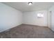 Bedroom with neutral carpet flooring, natural light from window, ceiling light at 2134 Dawson St, Indianapolis, IN 46203