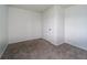 Cozy bedroom featuring neutral carpet, fresh paint, and a convenient closet at 2134 Dawson St, Indianapolis, IN 46203