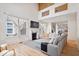 Bright living room features soaring ceilings, fireplace, hardwood floors and expansive windows at 2349 N Delaware St, Indianapolis, IN 46205