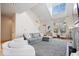 Inviting living room boasts a statement fireplace, lots of windows, and modern furnishings at 2349 N Delaware St, Indianapolis, IN 46205