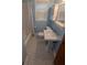 Cozy bathroom featuring hexagon tile floor, pedestal sink, and classic blue accents at , Indianapolis, IN 46220