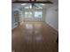 Bright and airy living room with vaulted ceilings, skylights, and laminate flooring at , Indianapolis, IN 46220