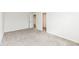 Spacious bedroom with neutral carpet, white walls, and closet at 286 Lar Lan Dr, Danville, IN 46122