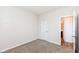 Neutral bedroom with plush carpeting and easy access to a bathroom at 286 Lar Lan Dr, Danville, IN 46122
