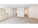 Spacious bedroom featuring neutral walls, soft carpet, and open doorway at 286 Lar Lan Dr, Danville, IN 46122