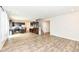 Expansive living space with wood-look floors seamlessly connects to the kitchen at 286 Lar Lan Dr, Danville, IN 46122