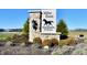 Stone sign reading 'Miles Farm The Estates' with a horse silhouette and decorative landscaping at 286 Lar Lan Dr, Danville, IN 46122