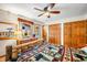 Spacious bedroom featuring a log-style bedframe, natural light, and ample closet space at 301 Lancelot Dr, Franklin, IN 46131