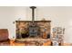 Close up view of the wood burning fireplace with stone surround at 301 Lancelot Dr, Franklin, IN 46131