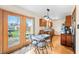 Open kitchen and dining area with access to the backyard at 301 Lancelot Dr, Franklin, IN 46131