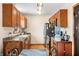 Traditional kitchen with stainless steel appliances and wooden cabinetry at 301 Lancelot Dr, Franklin, IN 46131