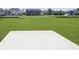 Backyard featuring a concrete patio and lush green lawn at 3241 Fawn Cir, Brownsburg, IN 46112
