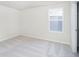 A bright bedroom with a window and neutral carpet at 3241 Fawn Cir, Brownsburg, IN 46112