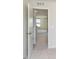 A carpeted hallway with open doors and white trim at 3241 Fawn Cir, Brownsburg, IN 46112