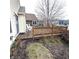 A wood deck overlooks the water and landscaping at 3259 Eddy Ct, Indianapolis, IN 46214