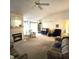 Spacious living room featuring a fireplace, carpet, and comfortable seating perfect for relaxing at 3259 Eddy Ct, Indianapolis, IN 46214