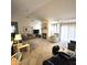 Open living room featuring a fireplace, comfortable seating, and a ceiling fan at 3259 Eddy Ct, Indianapolis, IN 46214