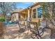 Brick patio area with outdoor seating, providing a relaxing space to enjoy the surrounding landscaped yard at 328 Millridge Dr, Indianapolis, IN 46290