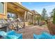 Brick patio with outdoor grill and furniture, ideal for entertaining and enjoying the backyard view at 328 Millridge Dr, Indianapolis, IN 46290