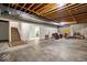 Unfinished basement with concrete floor and open ceiling, offering potential for customization and added living space at 328 Millridge Dr, Indianapolis, IN 46290