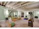 Finished basement with carpet flooring, exposed ceiling beams and workout equipment, creating a functional fitness area at 328 Millridge Dr, Indianapolis, IN 46290