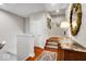 Entryway with hardwood floors, stairs, and lamp at 328 Millridge Dr, Indianapolis, IN 46290