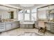 This elegant bathroom features a double vanity, modern fixtures, and a soaking tub at 328 Millridge Dr, Indianapolis, IN 46290
