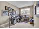 Bright office space with a large window and wall art at 328 Millridge Dr, Indianapolis, IN 46290