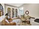 Bright home office space with custom built-ins and large windows for natural light at 328 Millridge Dr, Indianapolis, IN 46290