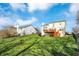 Spacious green lawn with a multi-tiered deck at 3341 Suffolk Ct, Greenwood, IN 46143