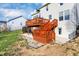 Multi-tiered deck and patio in a well-maintained backyard with green grass at 3341 Suffolk Ct, Greenwood, IN 46143