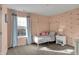Charming room with a canopy bed, pastel walls and whimsical rainbow decals at 3341 Suffolk Ct, Greenwood, IN 46143