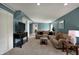 Spacious living room with comfortable seating, carpeted floors, and a view to another room at 3341 Suffolk Ct, Greenwood, IN 46143