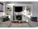 Inviting living room featuring a fireplace, built-in shelving, and comfortable seating at 3341 Suffolk Ct, Greenwood, IN 46143