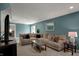 Inviting living room with comfortable couch, a TV and views to a bedroom and sliding glass door at 3341 Suffolk Ct, Greenwood, IN 46143
