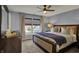 Spacious main bedroom with a large bed, window seating, and neutral décor at 3341 Suffolk Ct, Greenwood, IN 46143