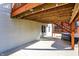 Spacious covered patio featuring outdoor lighting, access to a backyard, and stairs to the upper deck at 3341 Suffolk Ct, Greenwood, IN 46143